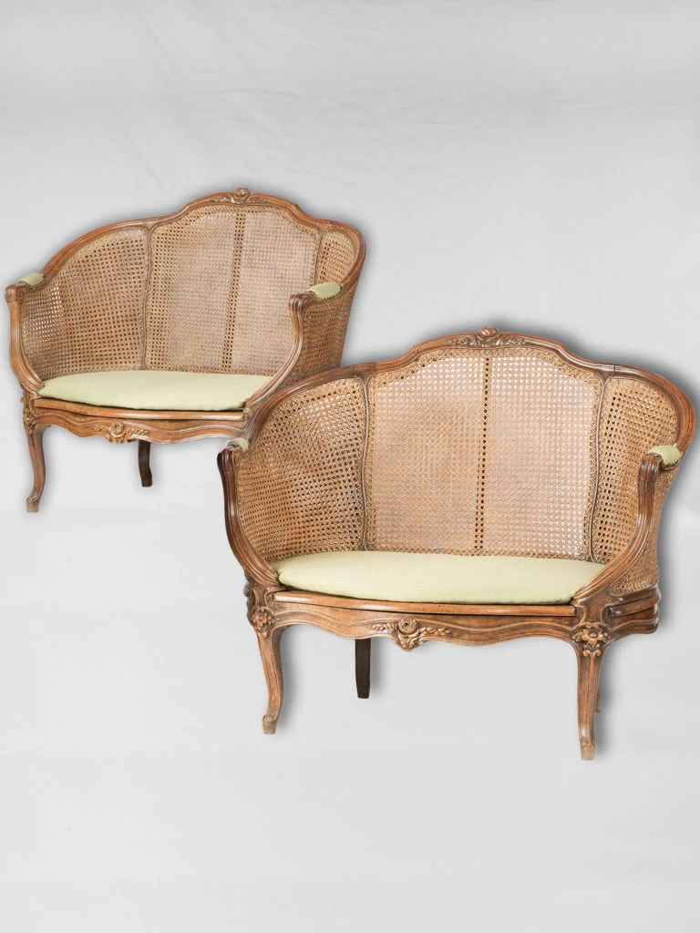 Pair of Louis XV settees w/ cane