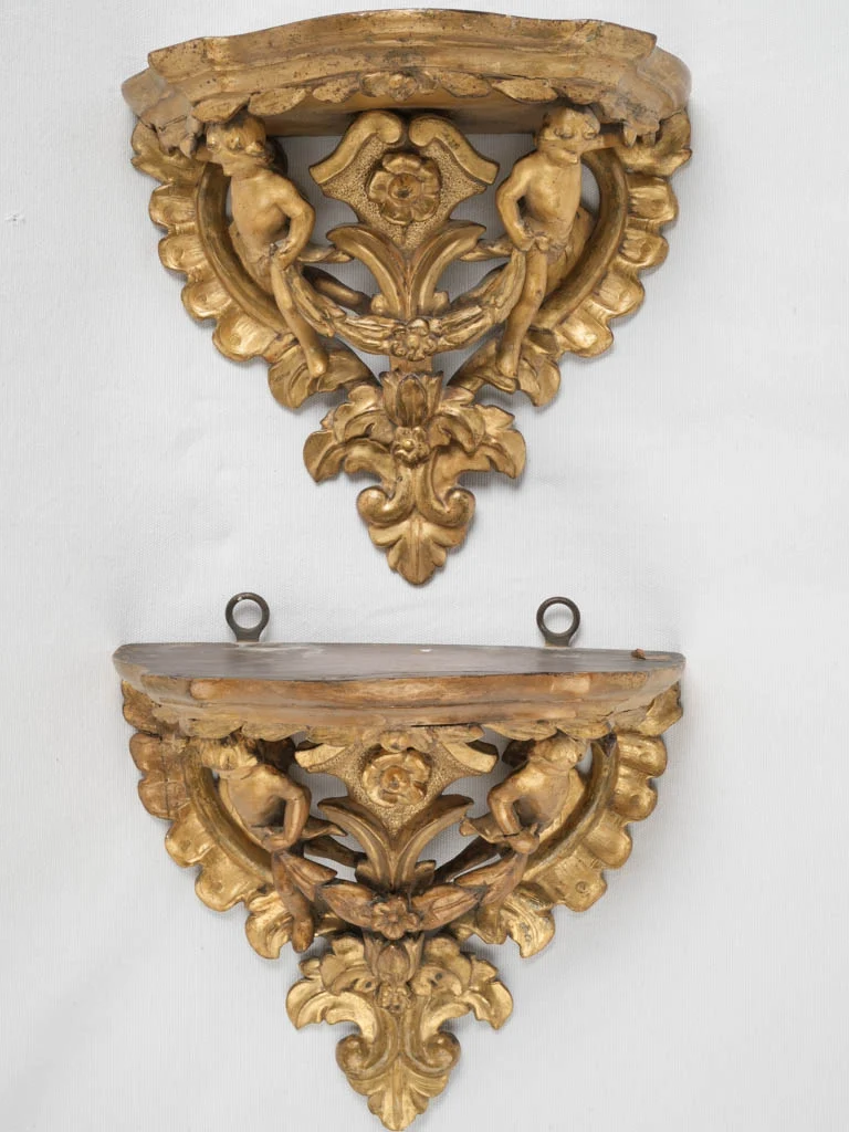 19th-century pair of giltwood wall consoles w/ cherubs 11"