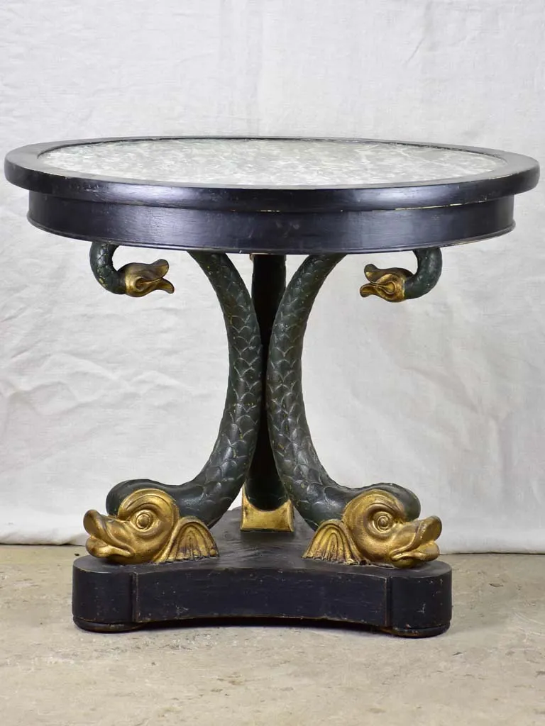 Restauration period round center table with dolphin base 32"