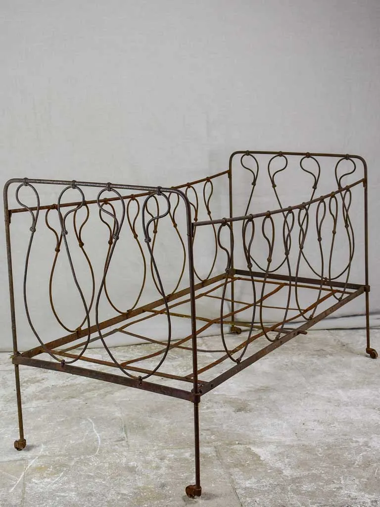 Antique French children's wrought iron bed