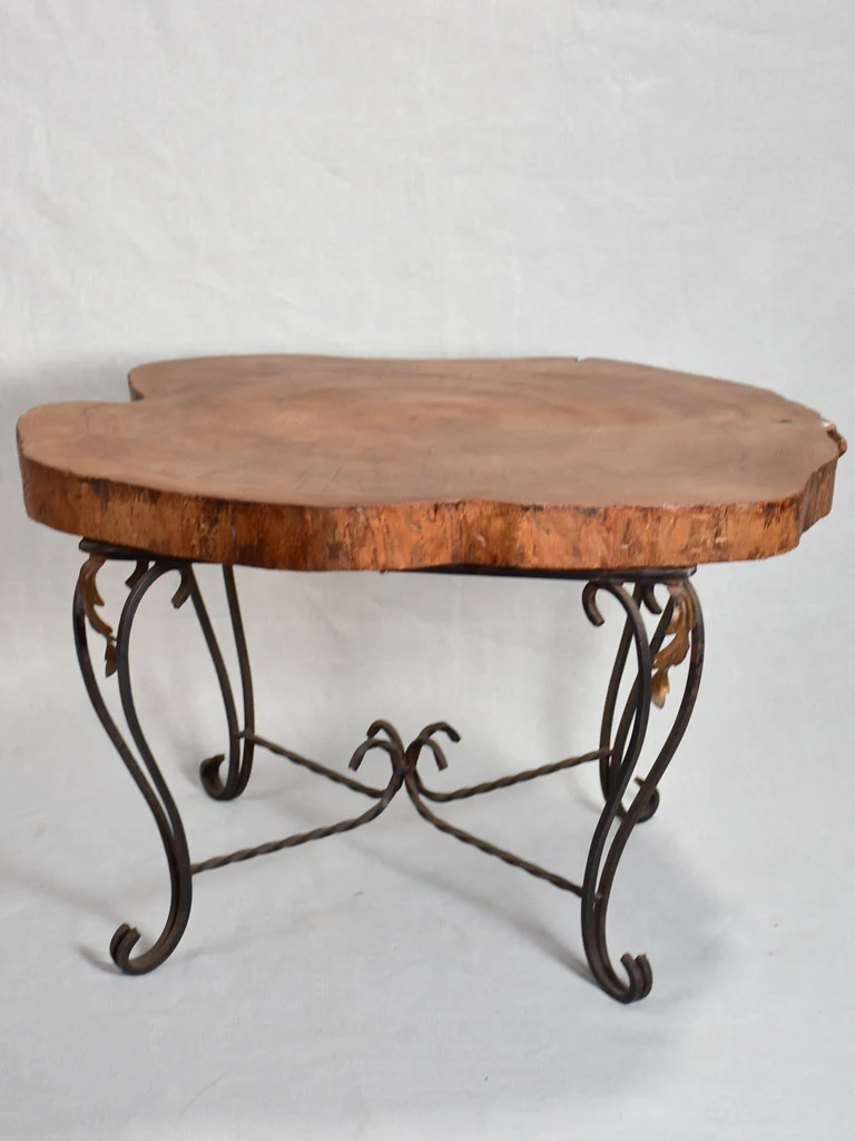 Mid-century brutalist tree trunk coffee table on wrought iron base 17"