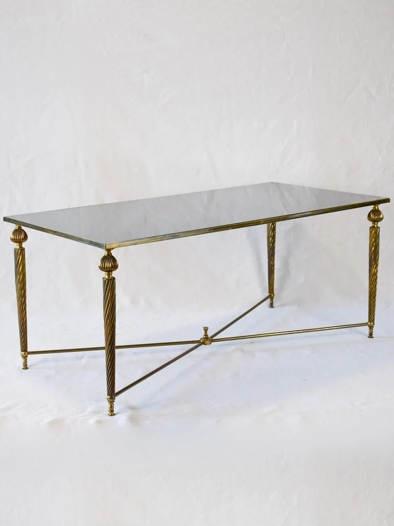 Mid century glass and brass coffee table with twisted tapered legs 39½" x 19¼"