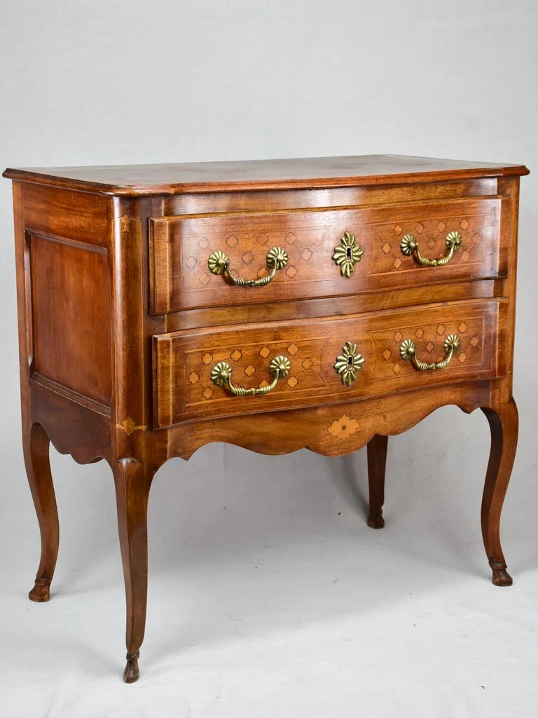 Antique French marquetry sauteuse commode with hoof feet