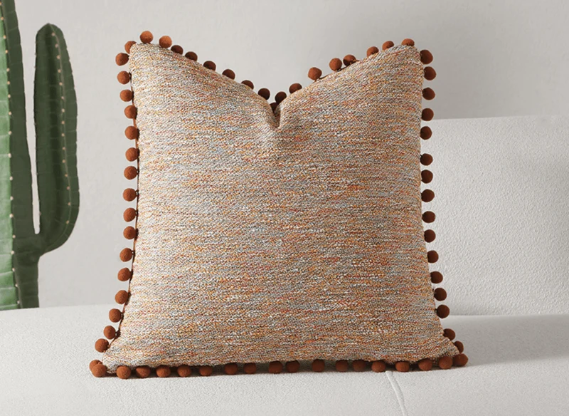 Coussin orange en tweed avec ponpons 45x45 cm POPINE